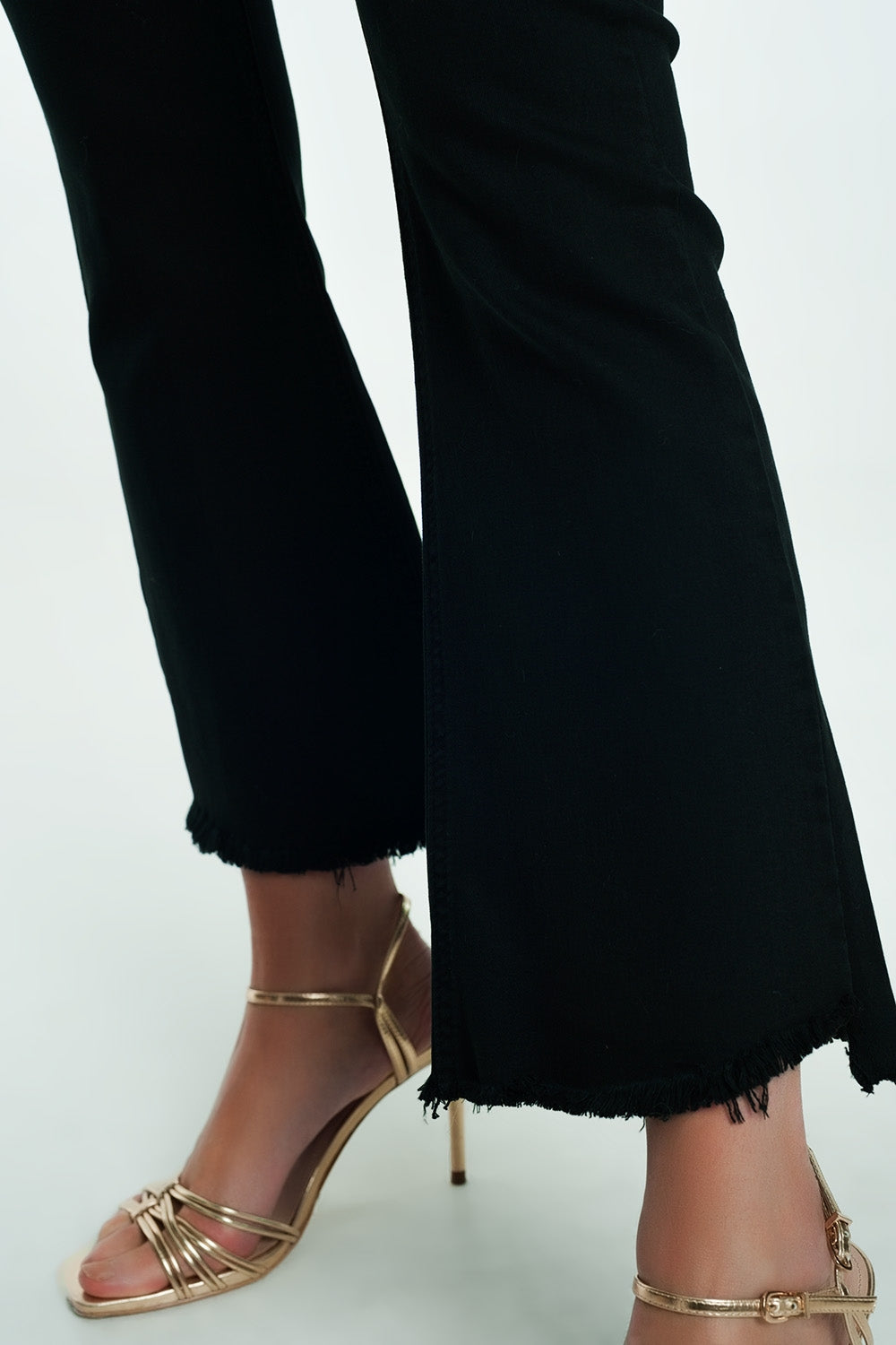 High Rise Raw Hem Flared Jeans in Black
