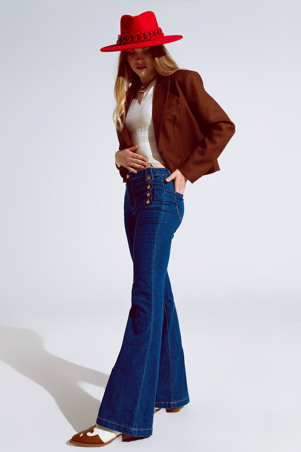 Skinny Flared Jeans in Dark Blue With Button Detail