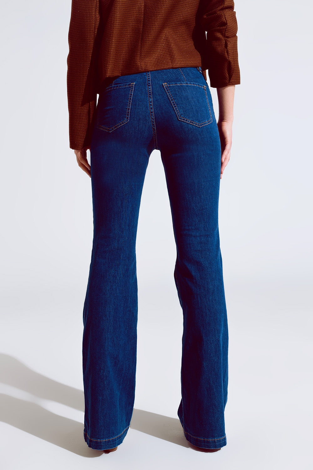 Skinny Flared Jeans in Dark Blue With Button Detail