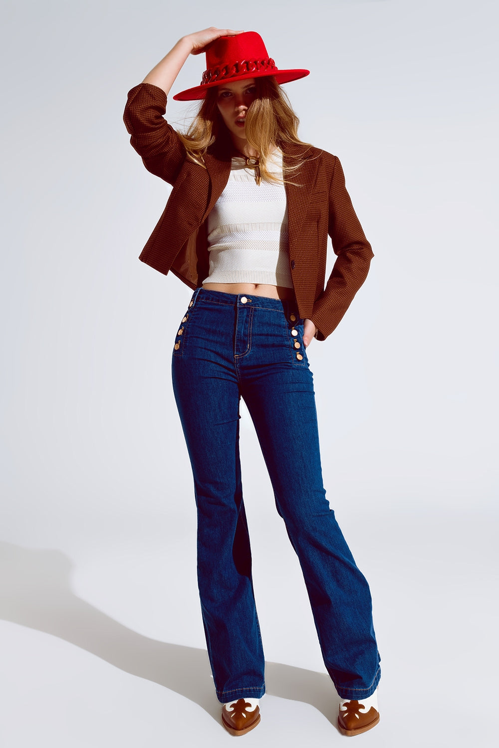 Skinny Flared Jeans in Dark Blue With Button Detail